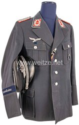 Luftwaffe Waffenrock und Schirmmütze aus dem Besitz von Major Millitzer im Flak-Regiment 9 " Legion Condor "